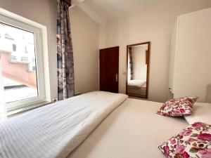 Postel nebo postele na pokoji v ubytování Apartments Tereza
