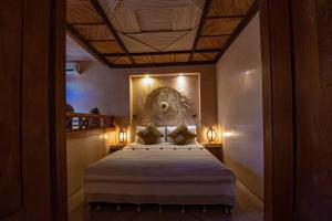 Postel nebo postele na pokoji v ubytování Riad Livia Marrakech - Adults Only