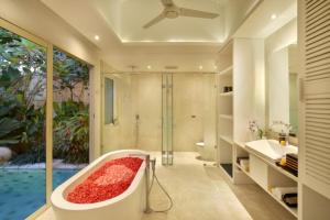 A bathroom at Aleva Villa Seminyak by Ini Vie Hospitality
