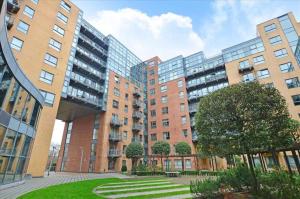 a group of tall buildings with a park in front at Large 2 Bed, 2 Bath, Free Parking & WiFi in Sheffield