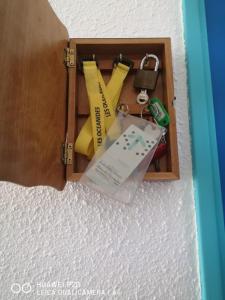 a wooden box with a bunch of items in it at LES OCEANIDES in Brétignolles-sur-Mer