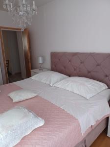 Posteľ alebo postele v izbe v ubytovaní Apartment Vestibul Inn