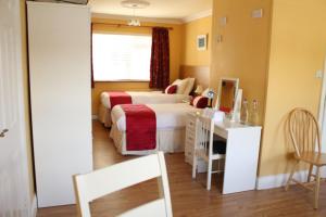 Letto o letti in una camera di Seacourt Accommodation Tramore - Adult Only