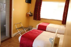 Letto o letti in una camera di Seacourt Accommodation Tramore - Adult Only