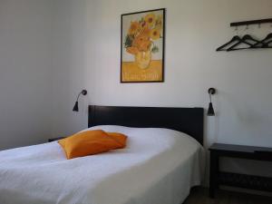Postel nebo postele na pokoji v ubytování Hals Hotel
