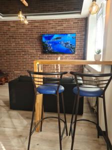 TV a/nebo společenská místnost v ubytování Narva City