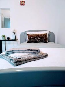 Postel nebo postele na pokoji v ubytování Moita Cottage