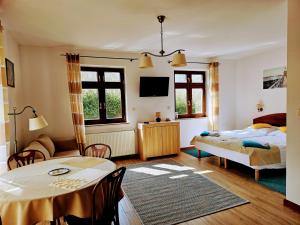Postel nebo postele na pokoji v ubytování Apartamenty z Klimatem