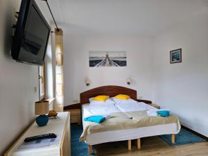 Postel nebo postele na pokoji v ubytování Apartamenty z Klimatem
