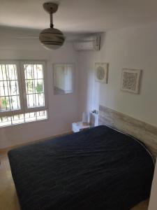 Кровать или кровати в номере Las Ramblas 828