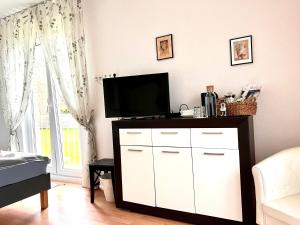 TV a/nebo společenská místnost v ubytování Casa Rehman