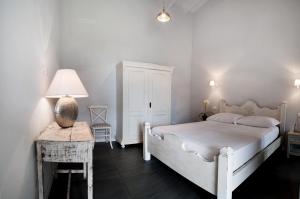 Posteľ alebo postele v izbe v ubytovaní Skipper White Guest House