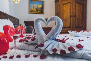 Postel nebo postele na pokoji v ubytování Hotel Boutique Casa Altamira