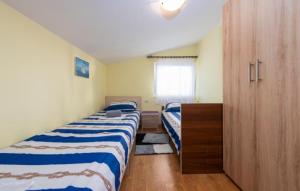 Postel nebo postele na pokoji v ubytování Apartman Zlata