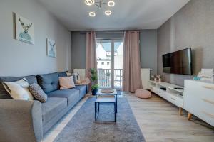 Et tv og/eller underholdning på LM APARTAMENTY PODGÓRNA Stare Miasto