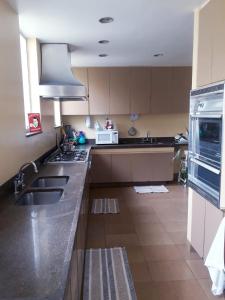 A cozinha ou kitchenette de Ila's house