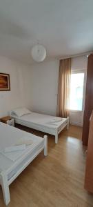 Postel nebo postele na pokoji v ubytování Apartment Anchor