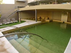 Swimmingpoolen hos eller tæt på Hotel Platino Termas All Inclusive