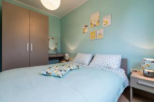 Ένα ή περισσότερα κρεβάτια σε δωμάτιο στο Villa Stari Punat