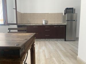 Η κουζίνα ή μικρή κουζίνα στο Apartamento Loft