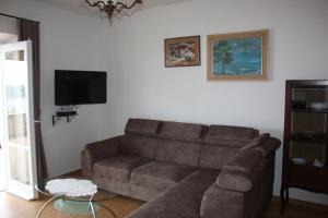 Televízia a/alebo spoločenská miestnosť v ubytovaní Apartment Amazing View