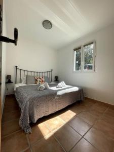 Posteľ alebo postele v izbe v ubytovaní Maison au calme avec piscine et climatisation