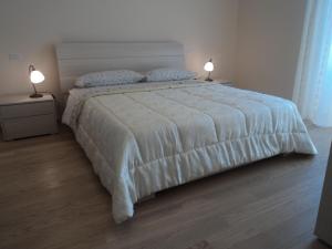 A bed or beds in a room at Casa Vacanze Gaia