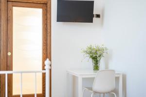 TV a/nebo společenská místnost v ubytování Casa Schiavoni