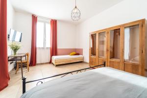 Ένα ή περισσότερα κρεβάτια σε δωμάτιο στο Casa Schiavoni
