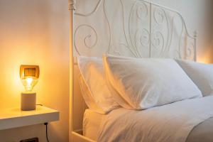 Postel nebo postele na pokoji v ubytování Casa Schiavoni