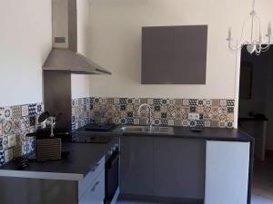 Gambar di galeri bagi Maison rénovée dans une ancienne propriété. di Montpellier