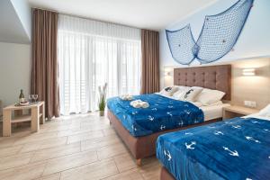Posteľ alebo postele v izbe v ubytovaní Villa Polna