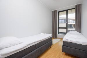 Katil atau katil-katil dalam bilik di Pärnu Luxury Penthouse