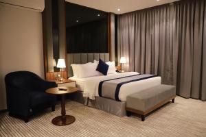 Postel nebo postele na pokoji v ubytování Tulip View Hotel + 37 fotografií