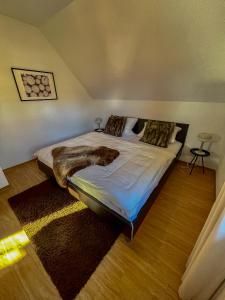 Postel nebo postele na pokoji v ubytování Ferienhaus am Wald