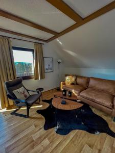 Posezení v ubytování Ferienhaus am Wald