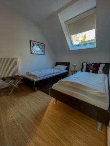 Postel nebo postele na pokoji v ubytování Ferienhaus am Wald