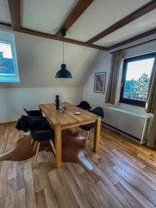 Posezení v ubytování Ferienhaus am Wald