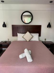 Postel nebo postele na pokoji v ubytování Hotel Diosa del Agua Bacalar
