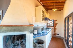 Kuchyň nebo kuchyňský kout v ubytování Agriturismo Podere Luisa