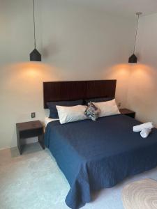 Postel nebo postele na pokoji v ubytování Hotel Diosa del Agua Bacalar