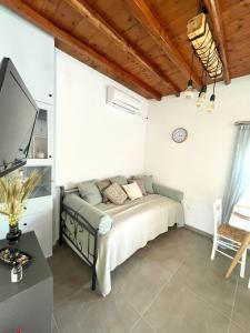 מיטה או מיטות בחדר ב-Lemon houses - Faros, Sifnos