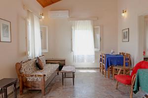 A seating area at Canal D'Amour by Katia