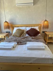 Posteľ alebo postele v izbe v ubytovaní LAGOM HOTEL