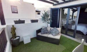 Posezení v ubytování Casa Mykonos 1° linea de mar en Playa Blanca