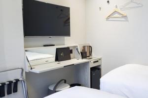 Voodi või voodid majutusasutuse Royal Jade Boutique Hotel toas