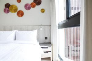 Televiisor ja/või meelelahutuskeskus majutusasutuses Royal Jade Boutique Hotel