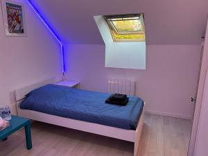 Posteľ alebo postele v izbe v ubytovaní Chambres dans maison familiale