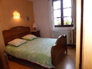 Postel nebo postele na pokoji v ubytování Le Castel Blanc