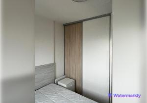 Una cama o camas en una habitación de T2 Face à la Mer & Village de Noël 5 min à pied